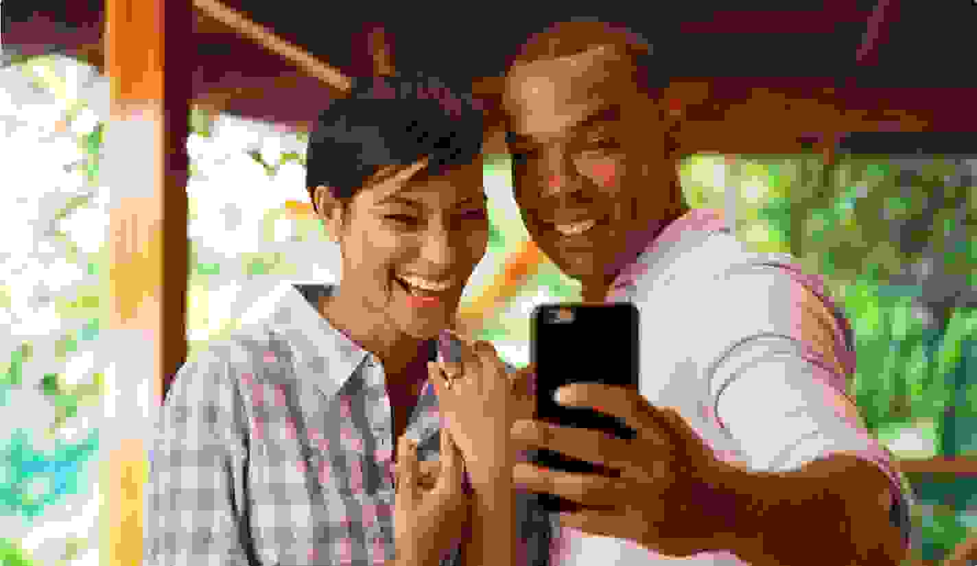 Couple taking a selfie after a proposal