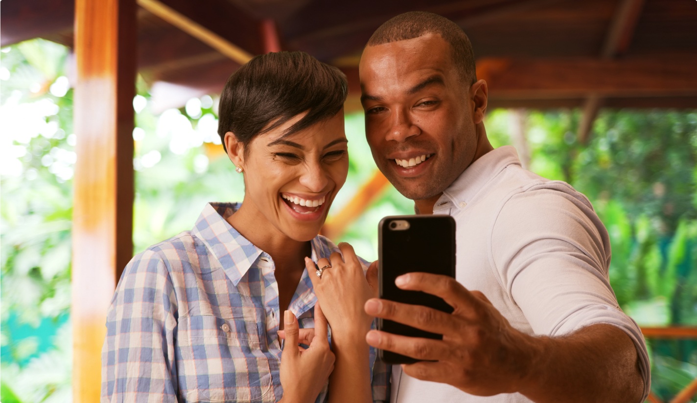 Couple taking a selfie after a proposal