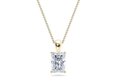 Lumina in Or jaune set with a Taille radiant cut diamant.