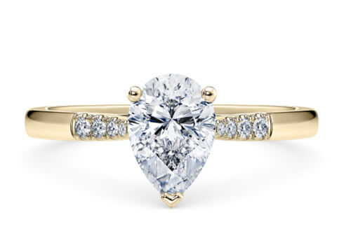 Thea in Yellow Gold set with a Pear cut diamond.
