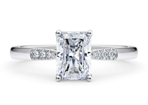 Thea in Platinum set with a Radiant cut diamond.