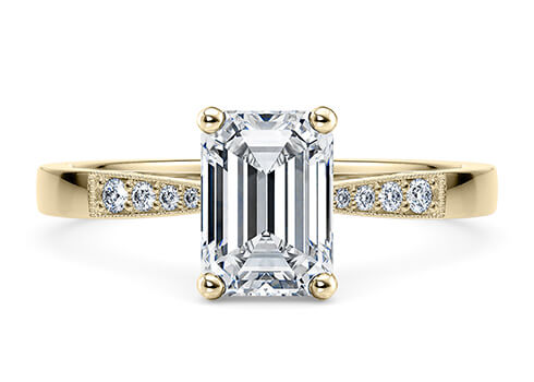 Delicacy Vintage in Yellow Gold set with a Emerald cut diamond.