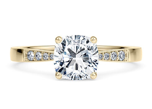 Delicacy Vintage in Yellow Gold set with a Cushion cut diamond.