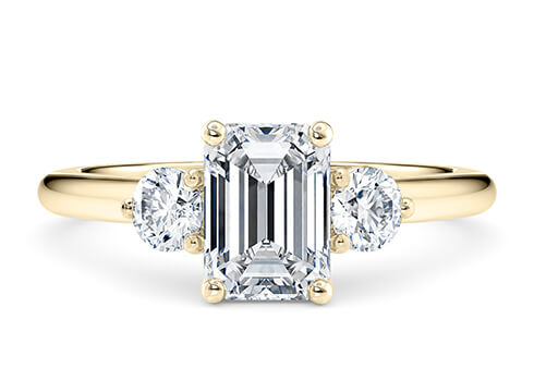 Valencia in Yellow Gold set with a Emerald cut diamond.