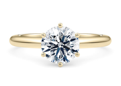 Allure in Oro amarillo (9k) set with a Redondo cut diamante.