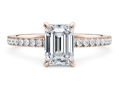 Aria in Rose Gold set with a Emerald cut diamond.