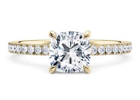 Aria in Gelbgold (9k) set with a Kissen cut diamant.