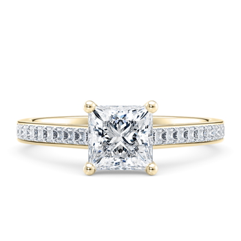 Aurora in Yellow Gold (9k) set with a Princess cut diamond.