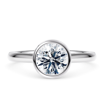 Luna in White Gold set with a Round cut diamond.