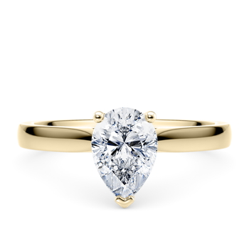 Contour in Or jaune set with a Taille poire cut diamant.