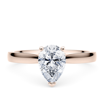 Contour in Or rose set with a Taille poire cut diamant.