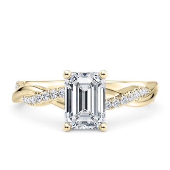 Pirouette in Oro giallo (9k) set with a Smeraldo cut diamante.