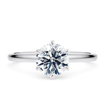 Etoile in Or blanc (9k) set with a Taille ronde cut diamant.
