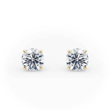Aria in Or jaune set with a Taille ronde cut diamant.