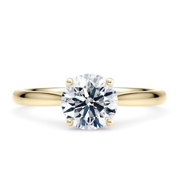 Lumina in Yellow Gold set with a Round cut diamond.