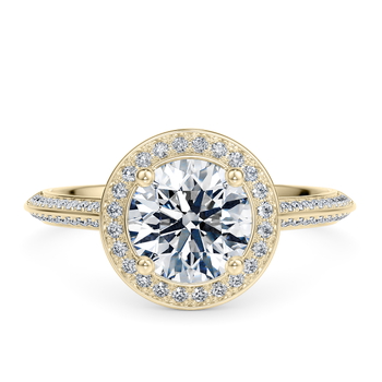 Olympia in Yellow Gold set with a Round cut diamond.