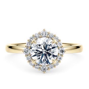Esther Halo in Yellow Gold set with a Round cut diamond.