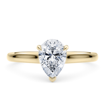 Amara in Gelbgold (9k) set with a Tropfen cut diamant.