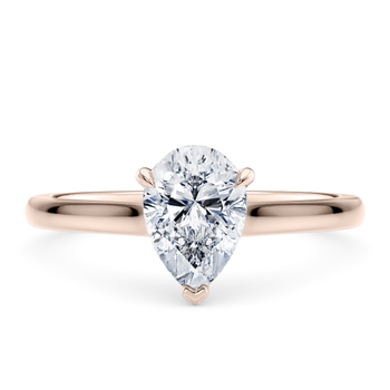 Amara in Rose Gold set with a Pear cut diamond.
