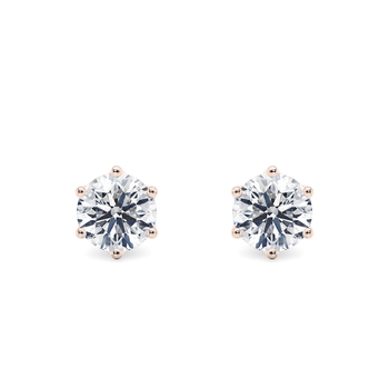 Dahlia in Rosaguld set with a Rund cut diamant.