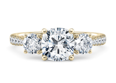 Lisbon in Yellow Gold set with a Cushion cut diamond.