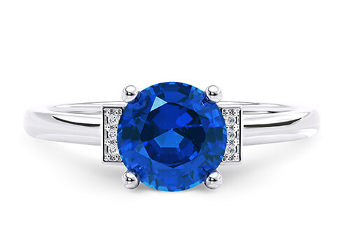 Beatrice in White Gold set with a Round cut Sapphire.