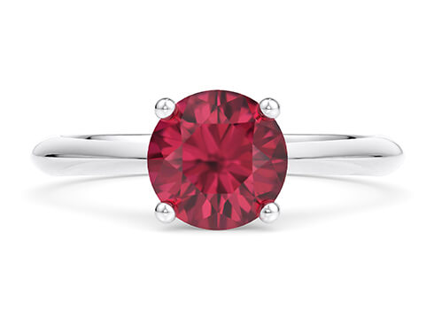 Iris in White Gold set with a Round cut Ruby.