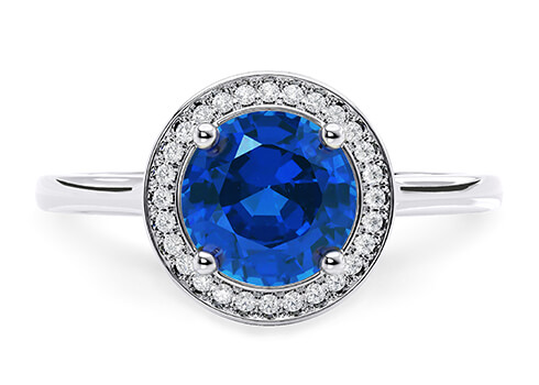 Minerva in White Gold set with a Round cut Sapphire.