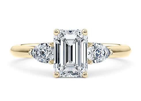 Florence in Yellow Gold set with a Emerald cut diamond.