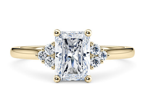 Rosa in Yellow Gold set with a Radiant cut diamond.