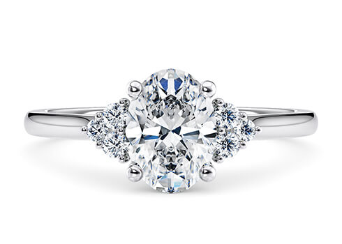 Rosa in Platinum set with a Oval cut diamond.