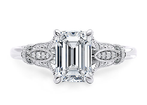 Jasmine in White Gold set with a Emerald cut diamond.