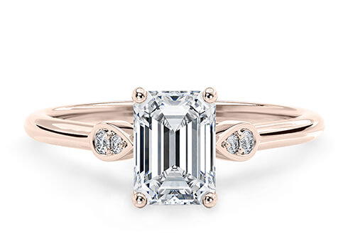 Primrose in Rose Gold set with a Emerald cut diamond.
