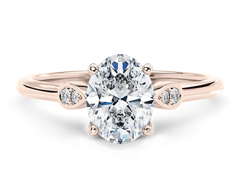 Primrose in Rose Gold set with a Oval cut diamond.