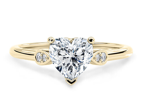 Primrose in Gelbgold set with a Herz cut diamant.