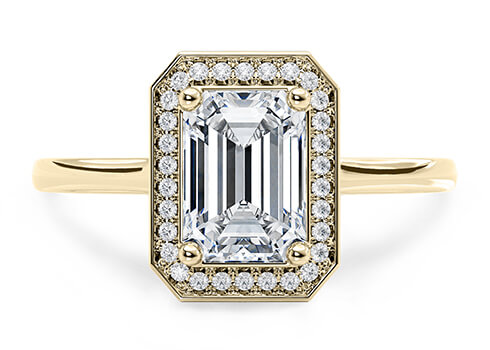 Minerva in Yellow Gold set with a Emerald cut diamond.