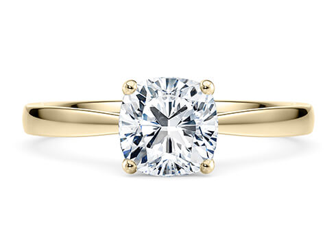Delicacy in Yellow Gold set with a Cushion cut diamond.