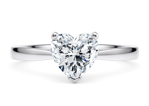 Delicacy in Platinum set with a Heart cut diamond.