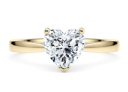 Delicacy in Yellow Gold set with a Heart cut diamond.