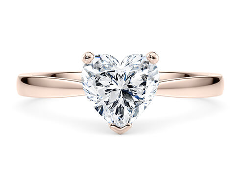 Delicacy in Rose Gold set with a Heart cut diamond.