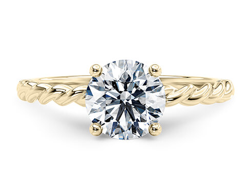 Ascot in Oro amarillo (9k) set with a Redondo cut diamante.