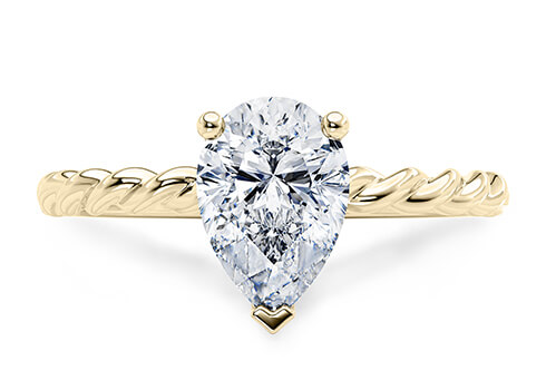 Ascot in Oro Amarillo set with a Pera cut diamante.