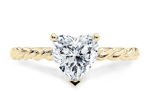 Ascot in Oro Amarillo set with a Corazón cut diamante.
