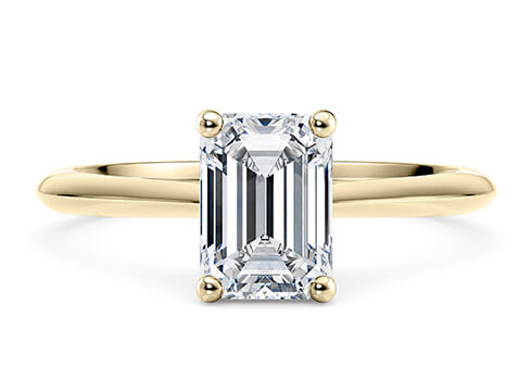 Hope in Oro Giallo set with a Smeraldo cut diamante.