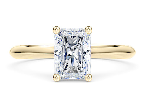 Iris in Or jaune (9k) set with a Taille radiant cut diamant.
