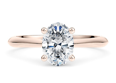 Iris in Rose Gold set with a Oval cut diamond.