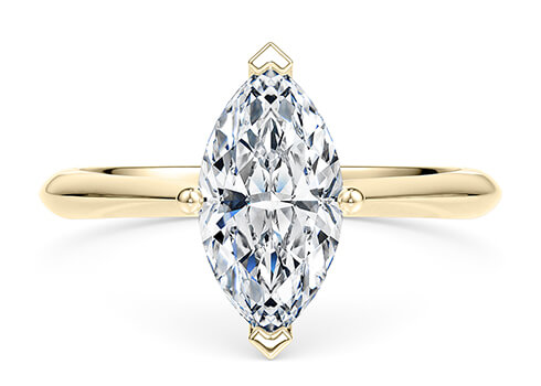 Iris in Yellow Gold set with a Marquise cut diamond.