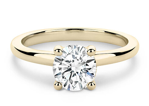 Eden in Yellow Gold set with a Round cut diamond.
