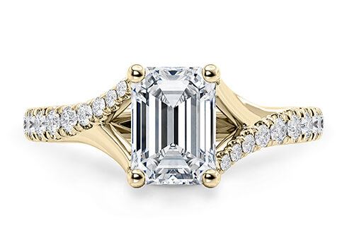 Valentine in Oro Amarillo set with a Esmeralda cut diamante.