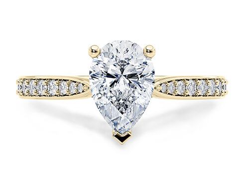 Victoria in Oro Amarillo set with a Pera cut diamante.